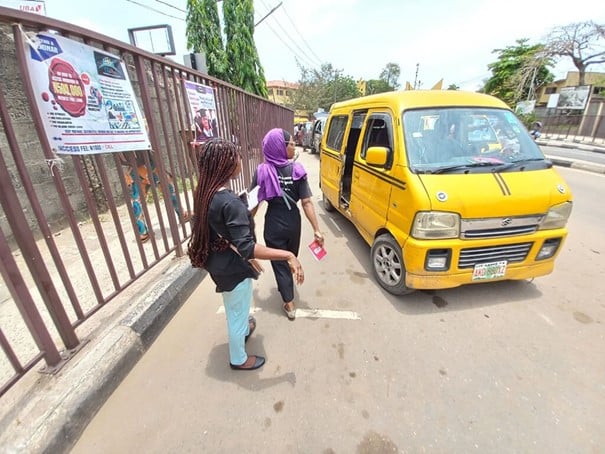 Girls waiting for school bus in Africa